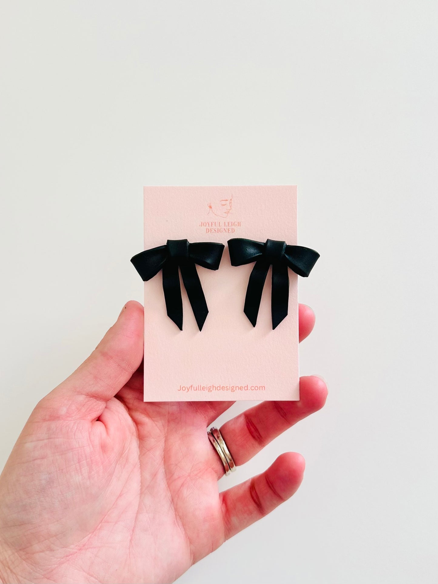 Black Statement Bow Studs