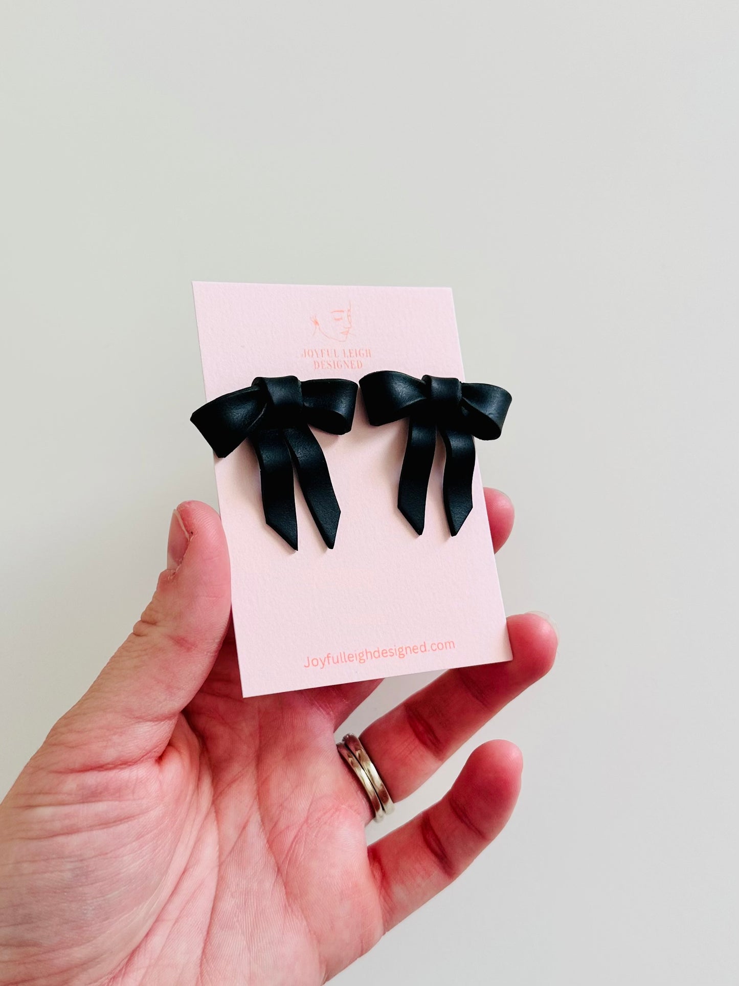 Black Statement Bow Studs