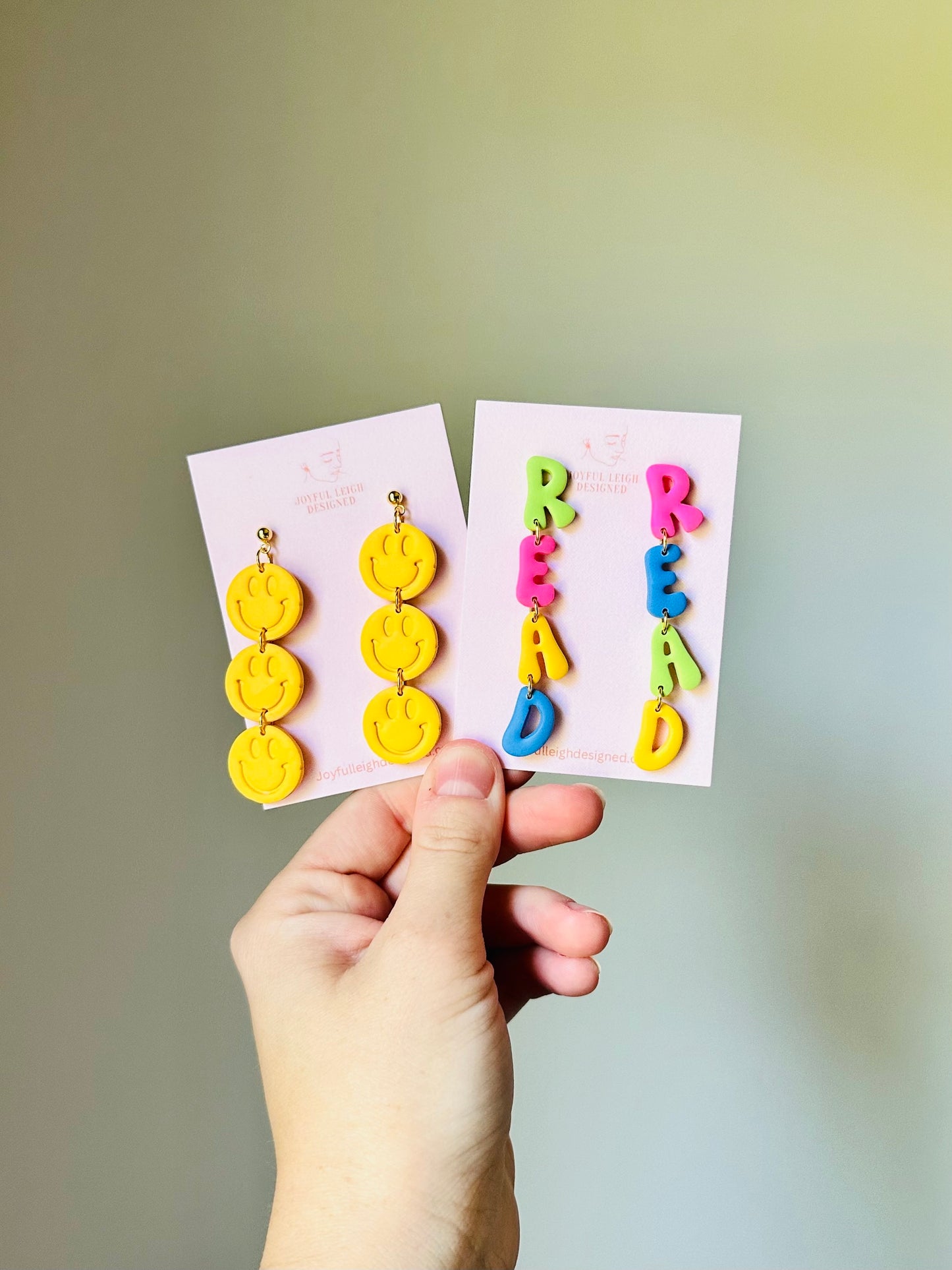 READ and Happy Face Earrings