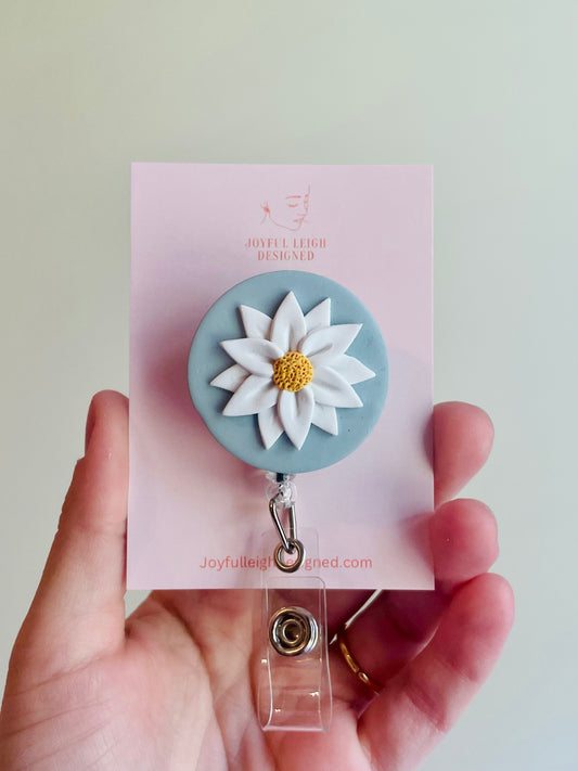 Daisy Blue Badge Reel