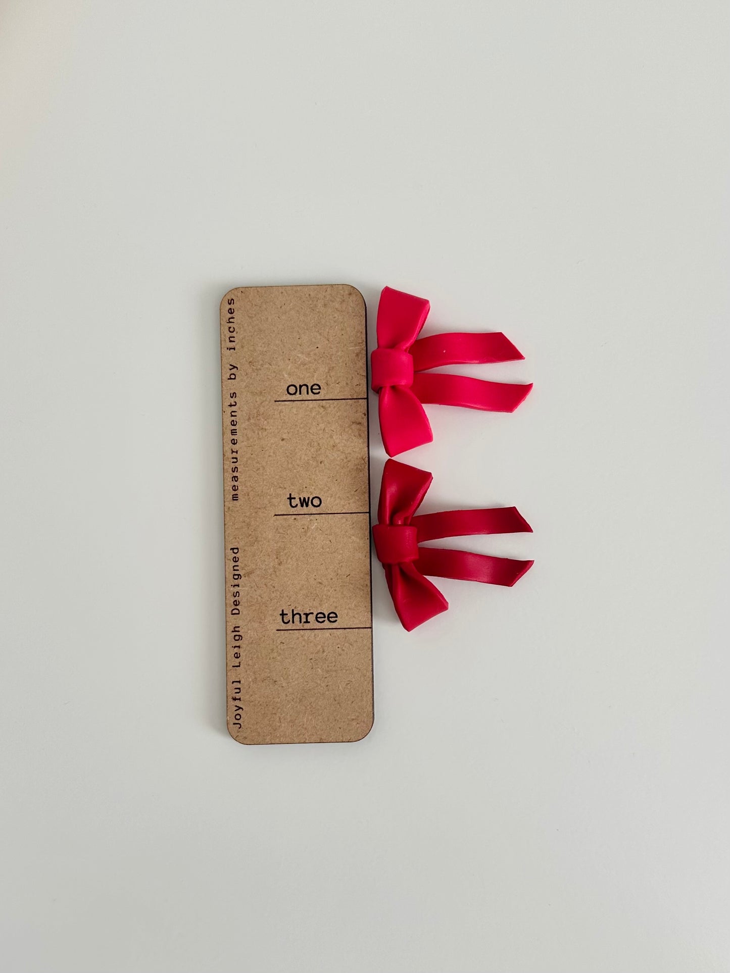 Red Bow Statement Studs