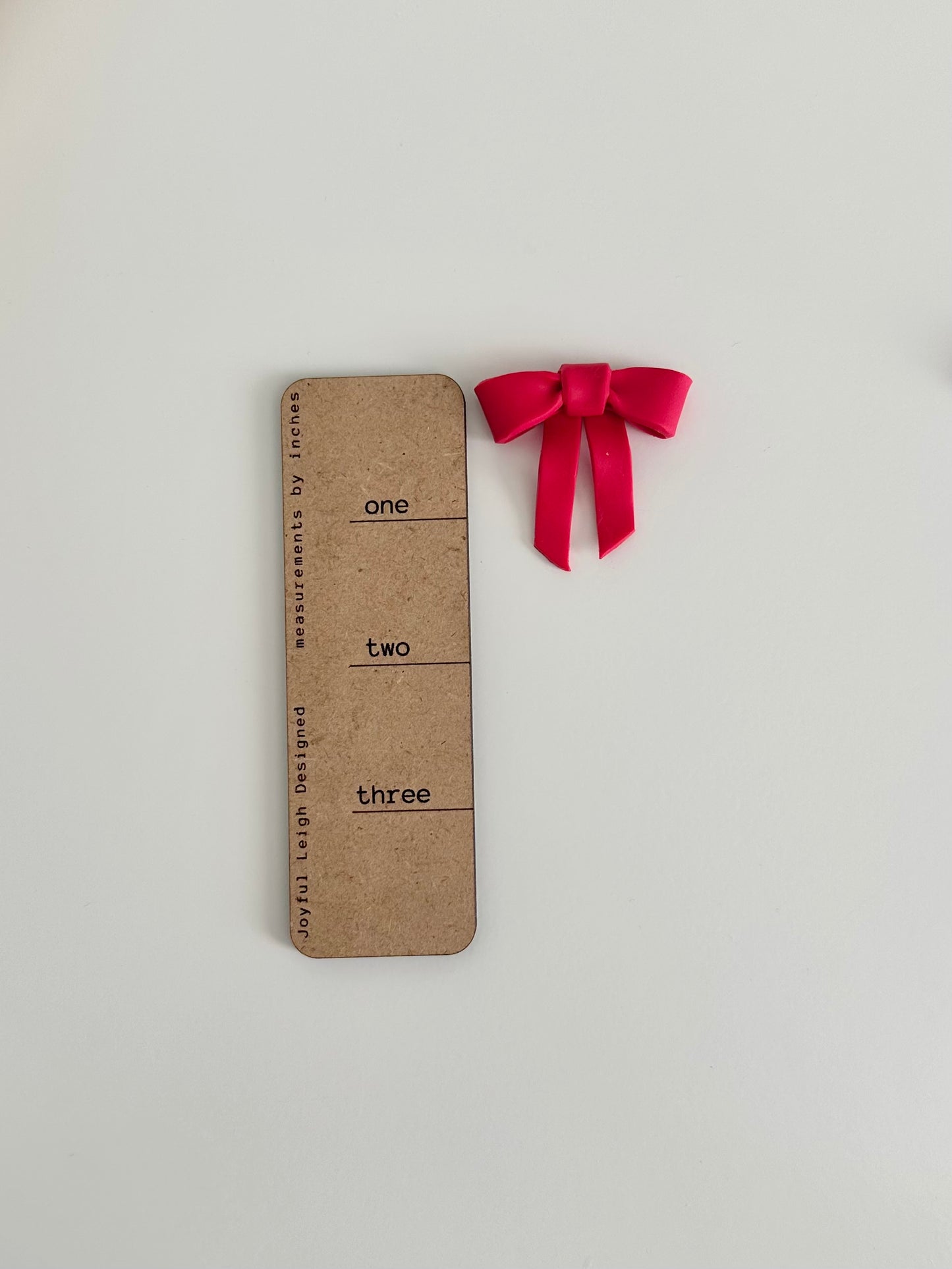 Red Bow Statement Studs