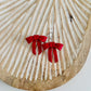 Red Bow Statement Studs
