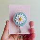 Daisy Blue Badge Reel